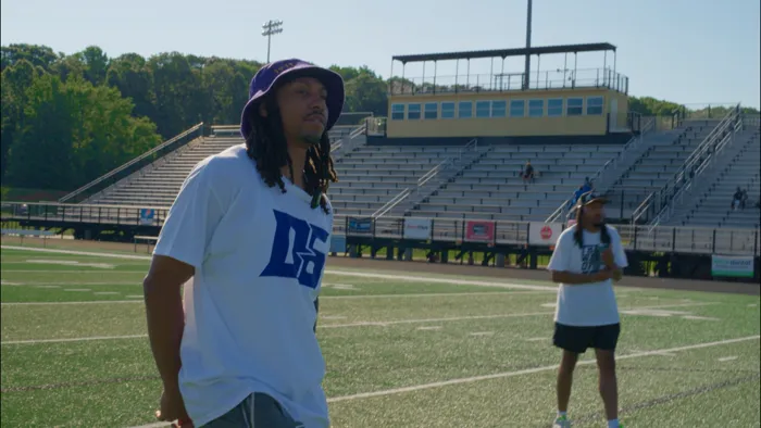 A F.A.S.T. Foundation coach mentoring a young athlete
